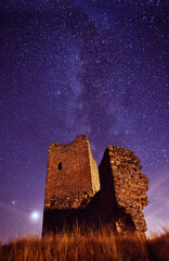 stars and dark sky with castle