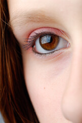 Close up of one eye of a teenaged girl