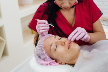 Cosmetic procedure to rejuvenate the skin and remove wrinkles for a young beautiful girl....