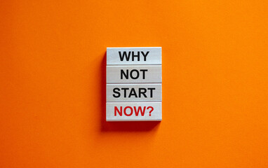Wooden blocks with words 'why not start now'. Beautiful orange background. Copy space, business concept.
