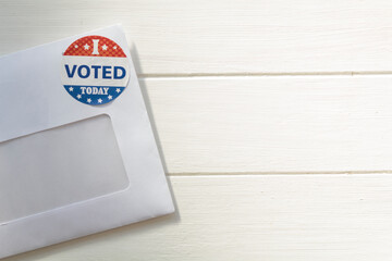 Envelope with voting ballot papers sent by mail for absentee vote in presidential election. Top...