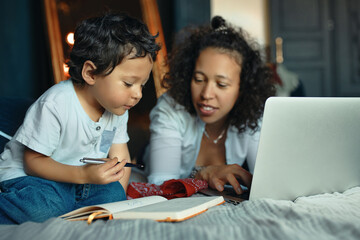 Early development, education, childhood and modern electronic gadgets. Portrait of caring young...