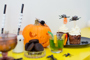 Obraz na płótnie Canvas Halloween food candy bar and pumpkin
