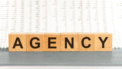 AGENCY word made with building blocks. concept.