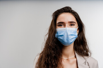 Girl in medical mask close-up. Coronavirus covid-19 quarantine concept.