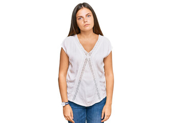 Obraz premium Young caucasian woman wearing casual clothes relaxed with serious expression on face. simple and natural looking at the camera.