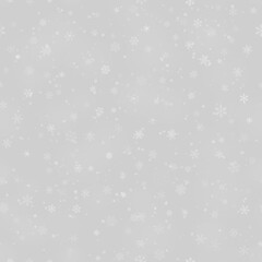 Christmas seamless pattern of snowflakes of different shapes, sizes and transparency, on gray background
