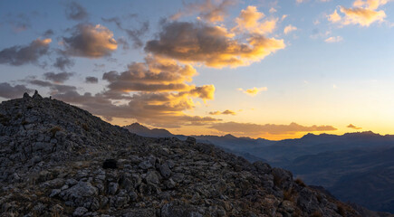 watching the sunset clouds at the top of a viewpoint located in huancavelica peru