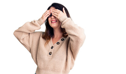 Beautiful young brunette woman wearing casual clothes and glasses covering eyes with hands smiling cheerful and funny. blind concept.