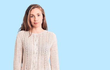 Young beautiful blonde woman wearing casual sweater looking sleepy and tired, exhausted for fatigue...
