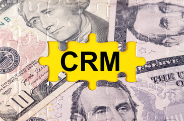 Puzzle with the image of dollars in the center of the inscription -CRM
