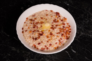 Bowl of homemade oatmeal, hot and healthy food for Breakfast