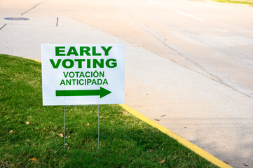 A sign directs residents to an early voting polling location for the 2020 Presidential election.
