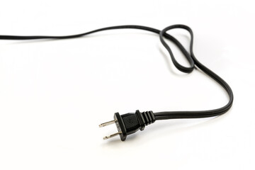 Black two pronged power cord with a curl trailing off into the distance