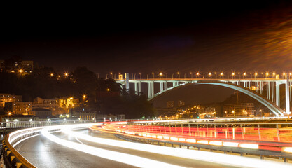 night view of the Arrabida bridge in Porto in Portugal - Oporto.