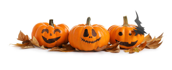 Cute Halloween pumpkins and autumn leaves on white background