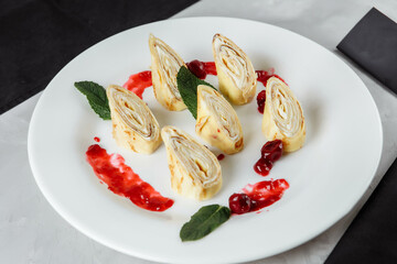 Pancakes with cottage cheese isolated on white background
