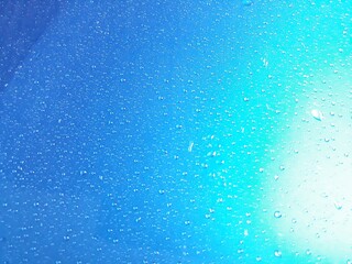 Abstract water drop texture image for optional focus rainy season concept background.