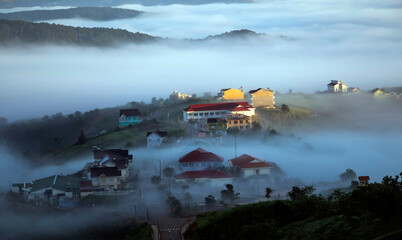 Fototapeta premium Small town in the clouds