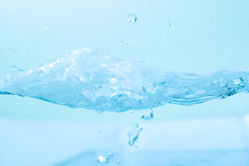 Water droplets moving in waves