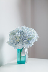 Beautiful flowers in the glass vase.