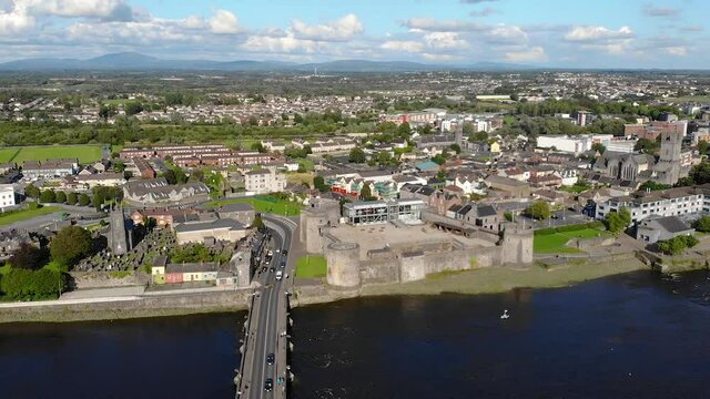 King John's Castle on King's Island, Limerick City, Ireland.  Drone Aerial View of Landmark and Cityscape by Shannon River on Summer Day