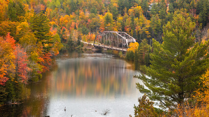 Old high way 510 bridge near Marquette city in Michigan upper peninsula during autumn time.