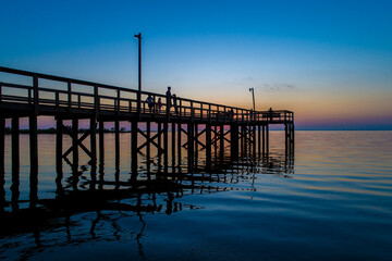pier at sunset on Mobile Bay, Alabama 