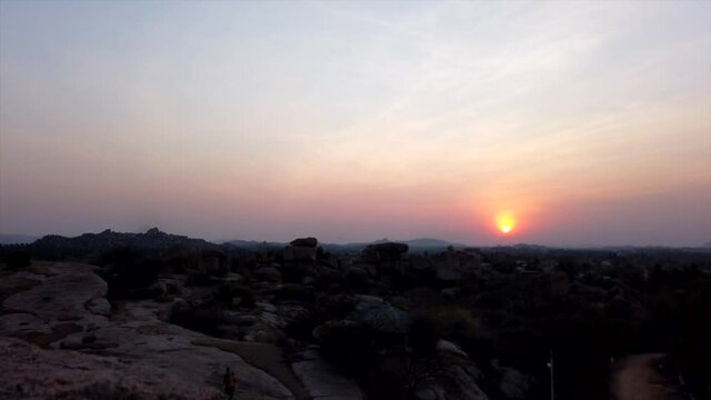 Motion Control Timelapse of Hampi Boulders and Temples at Sunset at Karnataka, India.