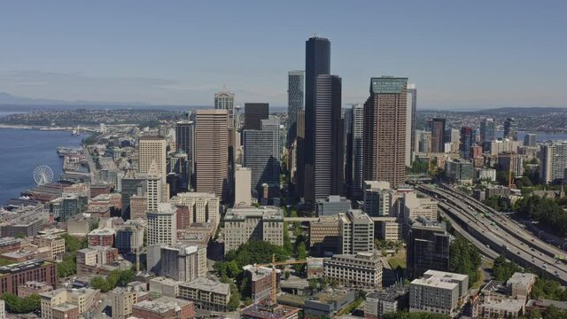 Seattle Washington Aerial v124 pan right shot of Yesler Terrace neighborhood, skyscrapers and freeway - June 2020