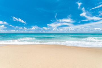 Fototapeta na wymiar Beach sea sand background, with sunny sky.