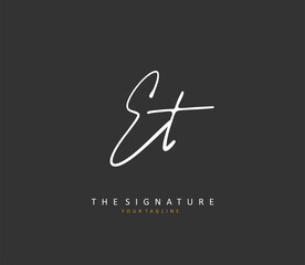 E T ET Initial letter handwriting and signature logo. A concept handwriting initial logo with template element.