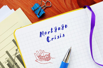 Conceptual photo about Mortgage Crisis with handwritten phrase.