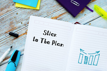 Stick to The Plan sign on the sheet.