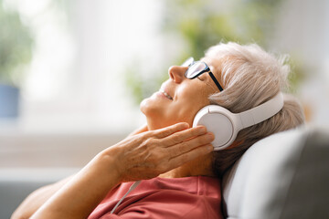 Senior woman listening to music