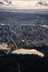 Downtown Vancouver, British Columbia, Canada. Aerial View of the Modern Urban City, Stanley Park, Harbour and Port. Viewed from Airplane Above during a sunny morning. Artistic Render