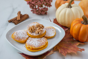 Healthy autumnal breakfast - sweet home made pumpkin pancakes