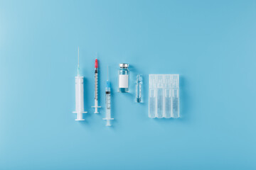 A set of medicines in ampoules and syringes for the treatment of viruses, vaccination and diseases.