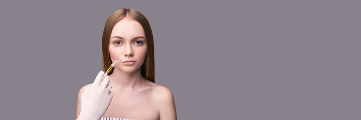 Closeup of rejuvenation lip. Beauty female face. Plastic surgery. Healthcare concept. Medical...