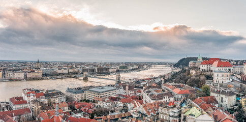 Fototapeta na wymiar Aerial drone shot of Danube river by Buda Hill in Budapest winter morning