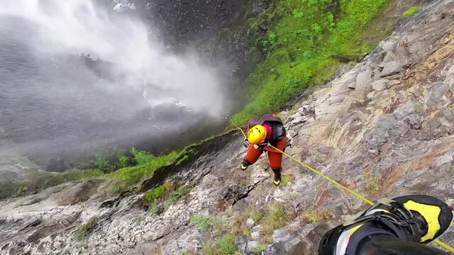 Descending a 300-meter rappel to the Trou de Fer hole, one of the most famous canyons in the world.