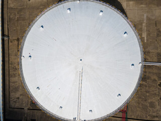 Drone aerial view oil And gas petrochemical industrial and oil storage tank. Oil station and gasoline tank on the ground drone flying over industrial oil storage refinery concept video, Shanghai China
