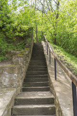 Fototapeta na wymiar Stone staircase in the park on the Castle Hill in Chyhyryn, Cherkasy region, Ukraine