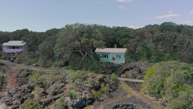 Aerial Footage of historic Baches on Rangitoto Island, Auckland, New Zealand