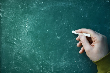 Chalkboard. Crayons for writing on a blackboard. Learning concept. School teaching chalk board.