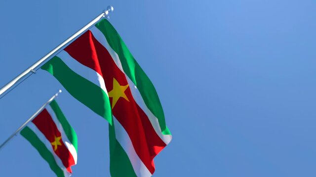 The national flag of Suriname flutters in the wind