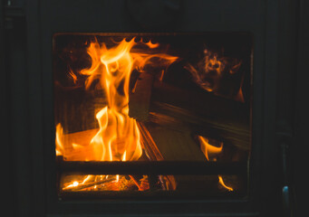 Logs Burning in Wood Stove, Fireplace, Home Heat