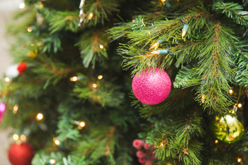 Sparkling Christmas Ornaments in Green Tree