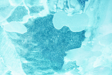 The ice background is light blue. Abstract background