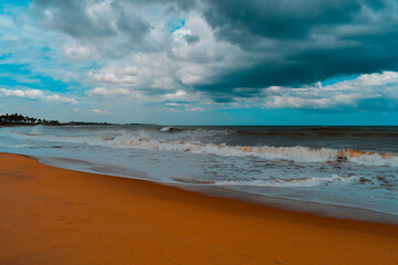 Rainy clouds on the aquatic beach.
